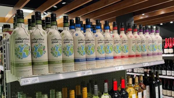 A variety of Collective Good wines on a retail store shelf.